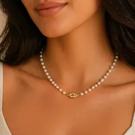 CHOKER PÉROLAS COM BÚZIO AO MEIO