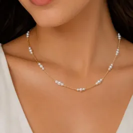 CHOKER TRIO DE PÉROLAS ESPAÇADAS