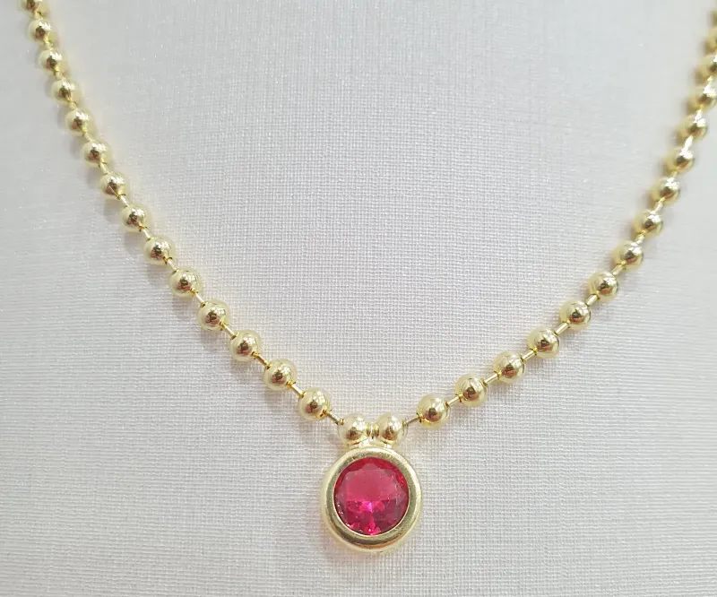 Colar de bolinhas com pedra de zircônia rubi