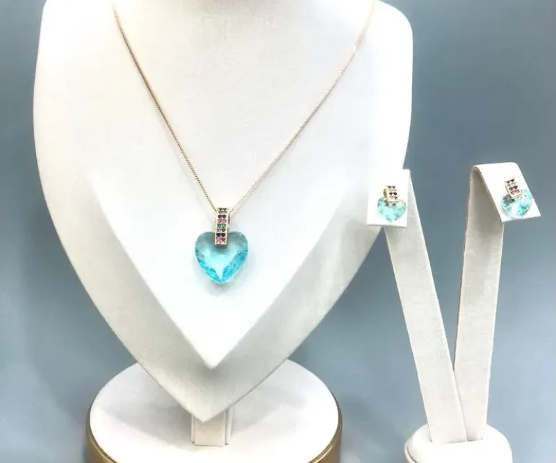 CONJUNTO CORAÇÃO PEDRA AZUL , CONTRA ARGOLA EM ZIRCÔNIAS