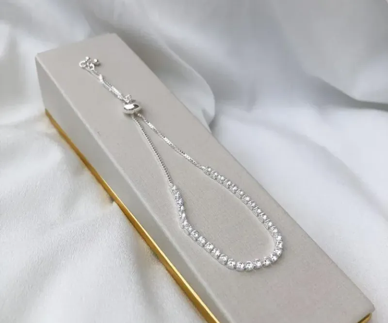 PULSEIRA GRAVATINHA DE ZIRCÔNIAS PRATA