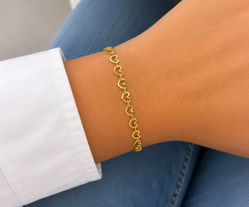 PULSEIRA CORAÇÕES VAZADOS ENTRE ELOS ACHATADOS